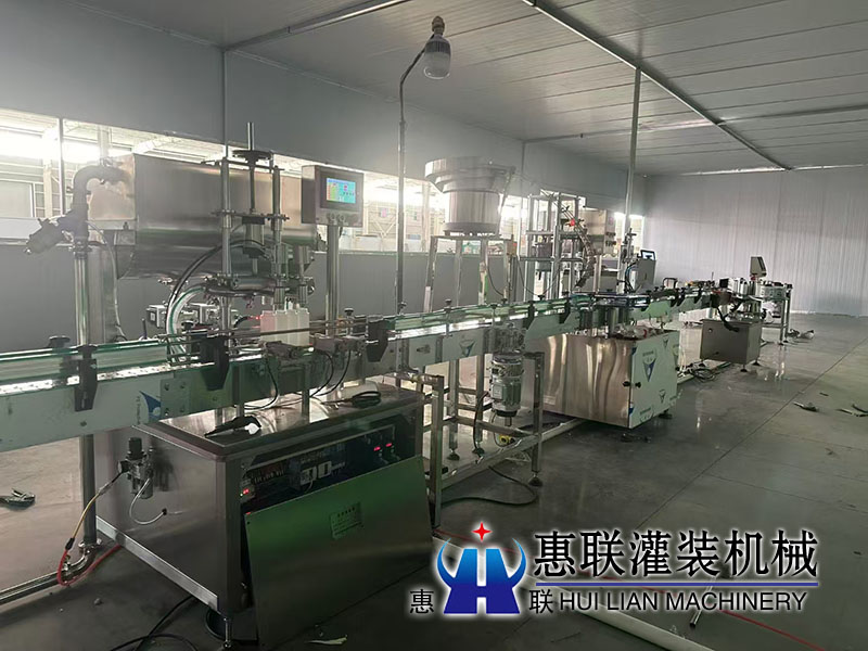 膠州油脂灌裝機生產線安裝調試現場